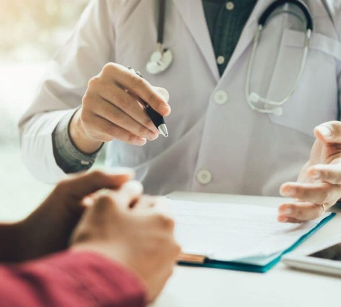 Doctor speaking with patient.