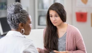 Young woman seeking medical advice.