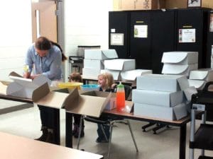 Lynne Glover works on 560 allergy-safe cupcakes